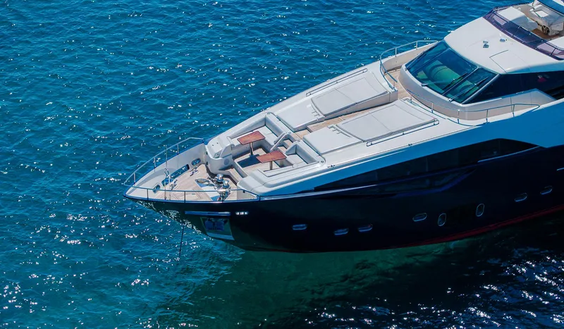 Slide: The Image of Luxurious 2012 Custom Line 100 yacht cruising on clear blue waters. - 5