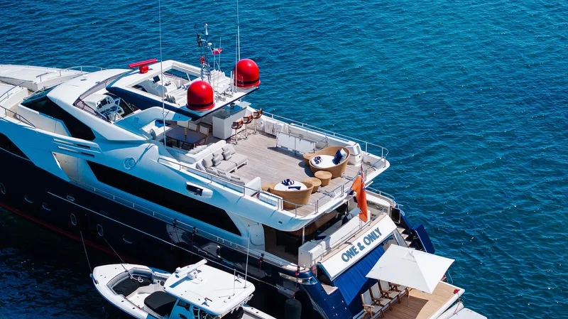 Slide: The Image of Luxurious 2012 Custom Line 100 yacht docked in clear blue waters. - 6