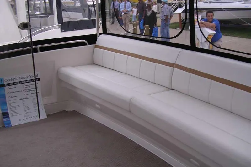 Slide: The Image of 2006 Carver 41 Cockpit Motor Yacht interior with white walls and sleek design. - 10