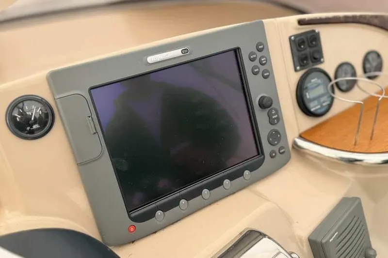 Slide: The Image of Raymarine E120 display on 2006 Carver 41 Cockpit Motor Yacht dashboard. - 22