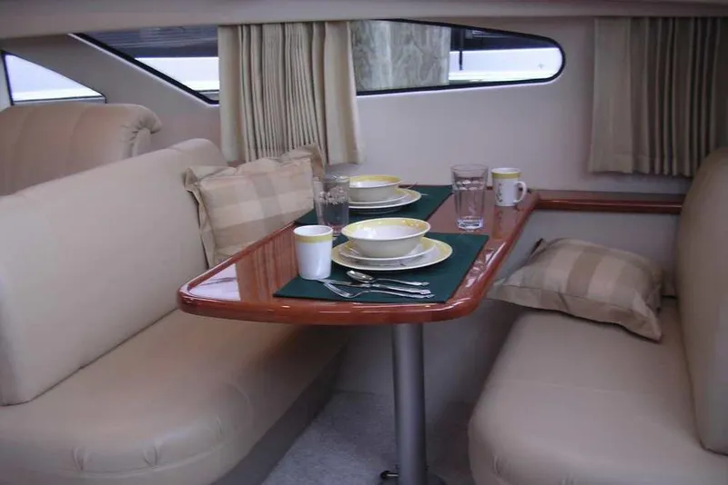 Slide: The Image of Control panel on 2006 Carver 41 Cockpit Motor Yacht with switches for vacu-flush, fan, and light. - 31