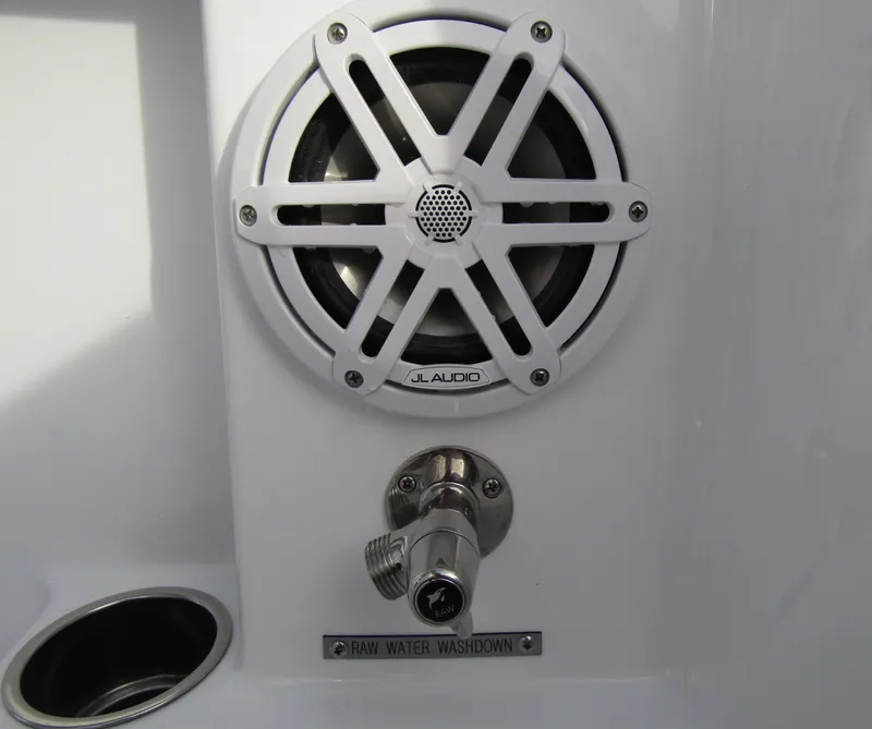 Slide: The Image of JL Audio speaker and raw water washdown on 2025 Wellcraft 243 Fisherman boat. - 31