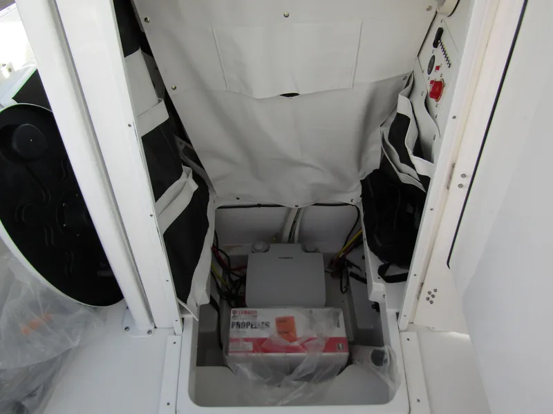 Slide: The Image of Interior storage compartment of 2025 Wellcraft 243 Fisherman boat. - 13