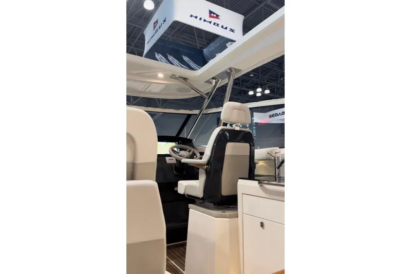 Slide: The Image of Interior of Nimbus W11 boat, 2025 model, featuring helm station. - 16
