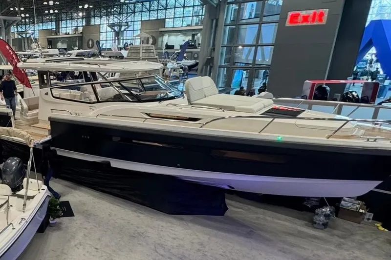 Slide: The Image of Nimbus W11 2025 displayed at a boat show. - 2