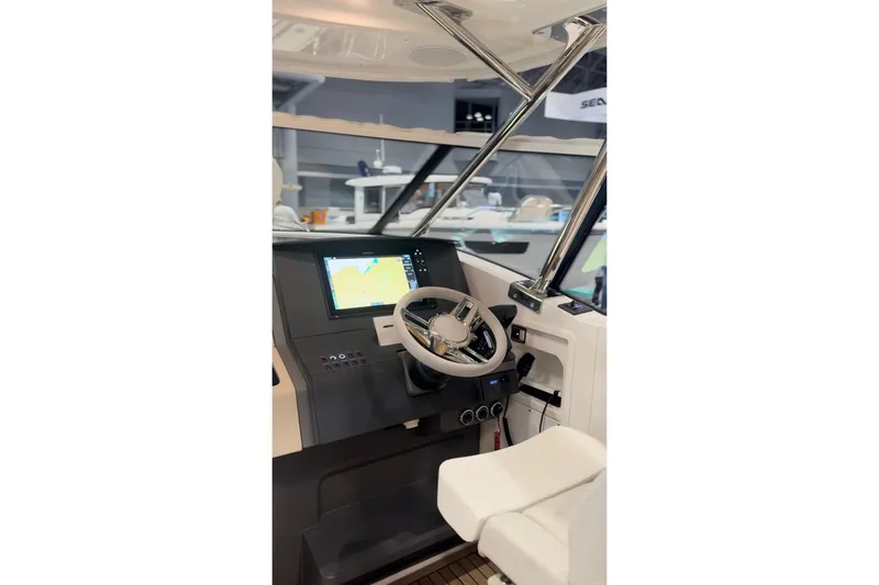 Slide: The Image of Interior view of Nimbus W11 2025 helm with navigation system. - 21