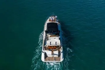 Slide: The Image of Azimut Fly 62 yacht from 2007 cruising on open water, aerial view. - 3