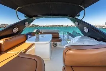 Slide: The Image of Luxurious 2007 Azimut Fly 62 yacht interior with elegant seating and ocean view. - 5