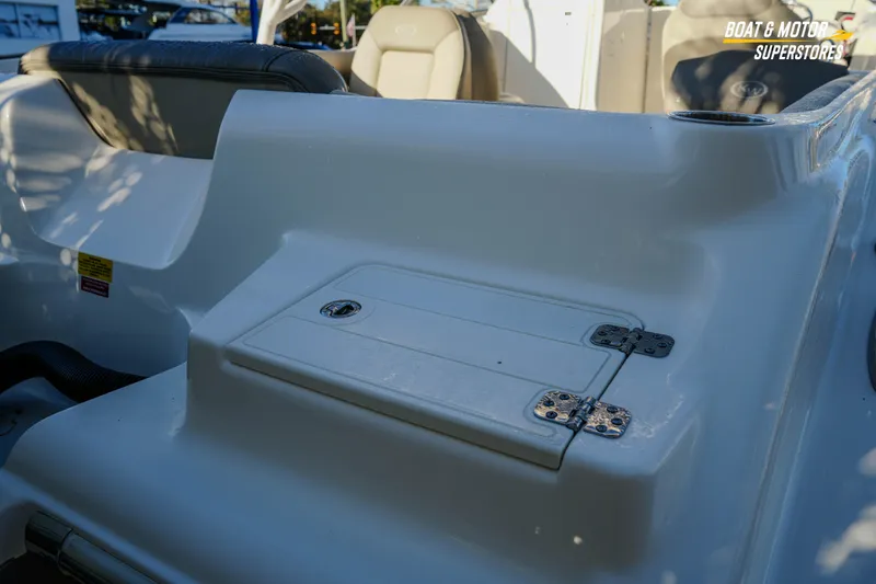 Slide: The Image of 2022 Key West 239 DFS boat interior with storage compartment and seating. - 16