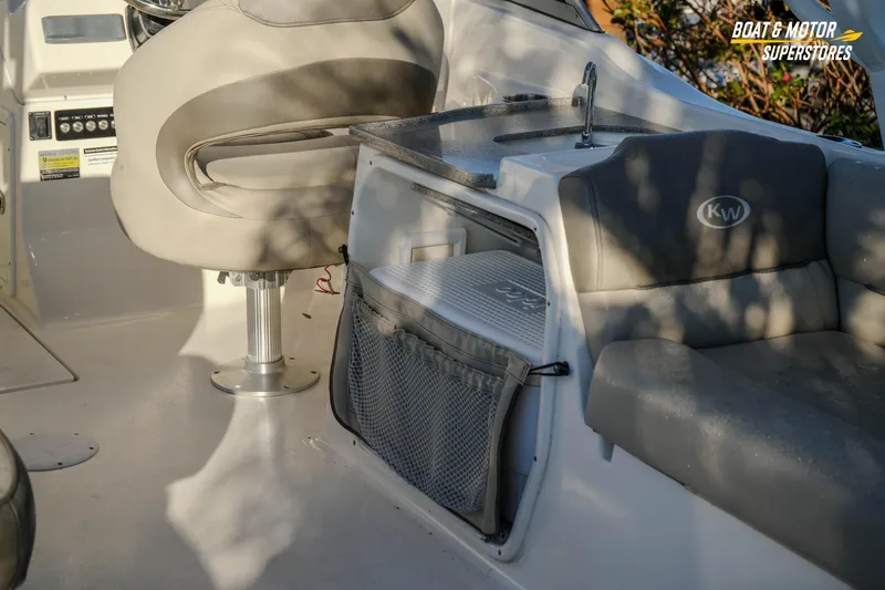 Slide: The Image of Interior of 2022 Key West 239 DFS boat with seating and storage area. - 19