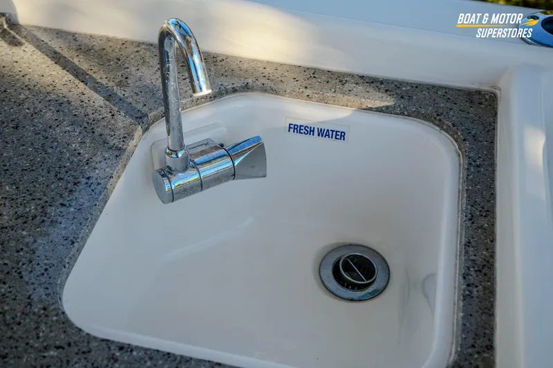 Slide: The Image of Freshwater sink on 2022 Key West 239 DFS boat, featuring a sleek chrome faucet. - 24
