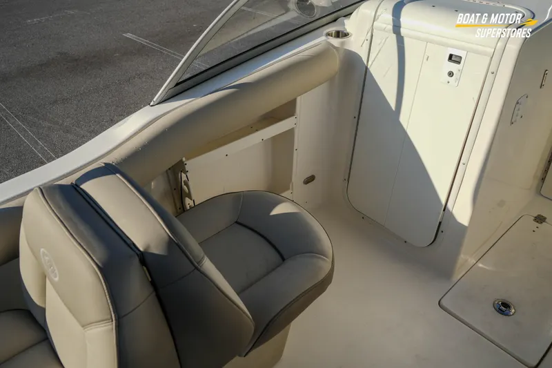 Slide: The Image of 2022 Key West 239 DFS boat interior with seating and storage area. - 28