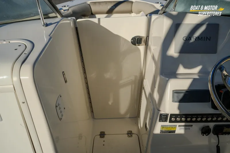 Slide: The Image of 2022 Key West 239 DFS boat interior with Garmin navigation system. - 30