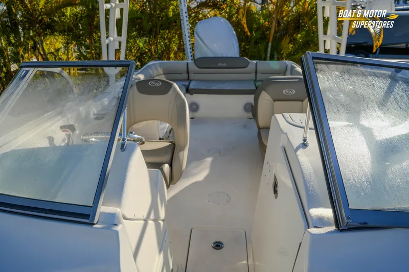 Slide: The Image of 2022 Key West 239 DFS boat interior with seating and windshield. - 33