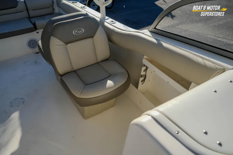 Slide: The Image of 2022 Key West 239 DFS boat interior with cushioned seating and sleek design. - 36