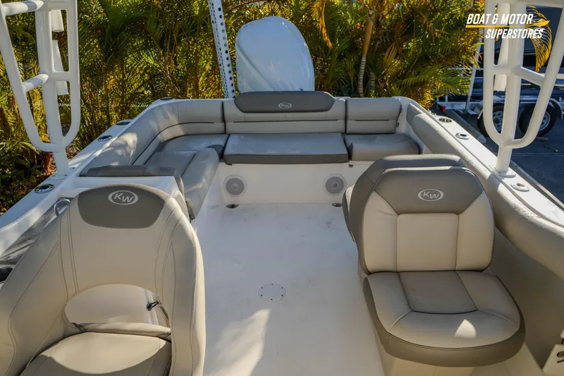 Slide: The Image of 2022 Key West 239 DFS boat interior with cushioned seating and sleek design. - 37