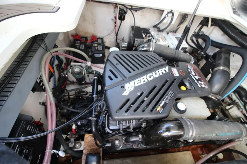 Slide: The Image of Engine compartment of a 2006 Sea Ray 340 Sundancer with Mercury engine. - 20