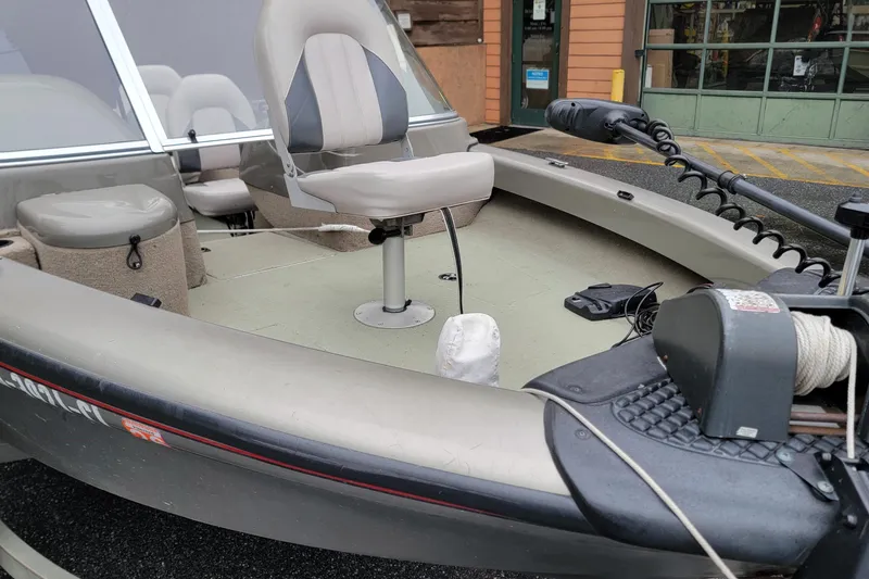 Slide: The Image of 2002 Tracker Tundra 18 WT boat interior with seating and equipment. - 3