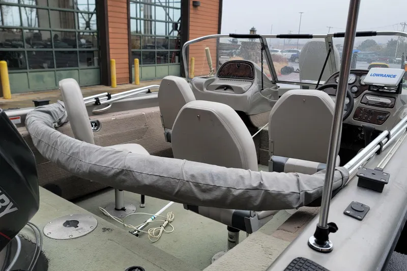 Slide: The Image of 2002 Tracker Tundra 18 WT boat interior with steering console and seating. - 5