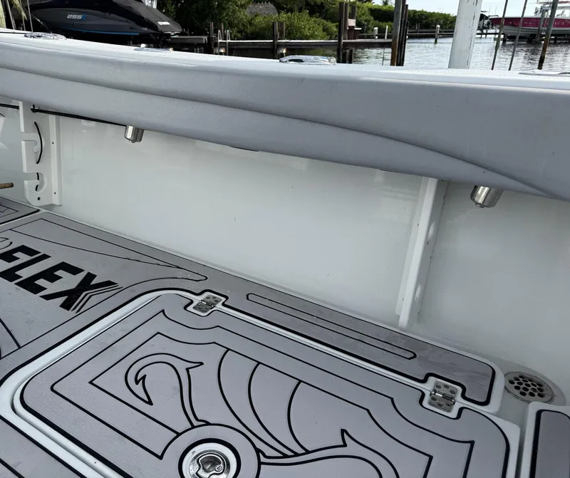 Slide: The Image of 2021 Yellowfin 26 Hybrid boat interior with custom deck design and sleek fittings. - 36