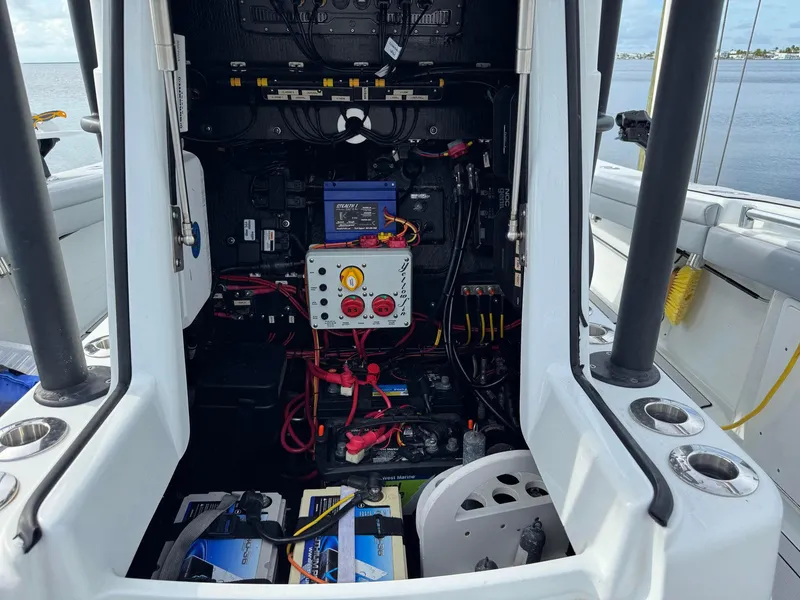 Slide: The Image of 2021 Yellowfin 26 Hybrid boat electrical system with wiring and battery setup. - 19