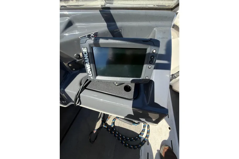 Slide: The Image of Lowrance fish finder on 2014 Larson LX 160S OB boat dashboard. - 10