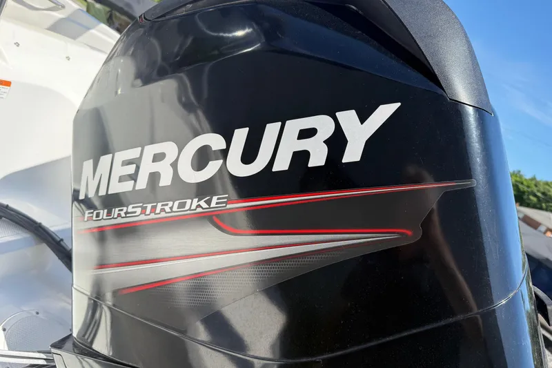 Slide: The Image of Mercury FourStroke engine on 2014 Larson LX 160S OB boat. - 23