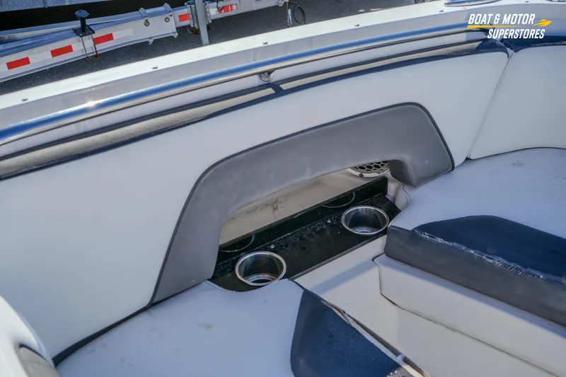 Slide: The Image of Interior of 2020 Monterey M-65 boat with cup holders and cushioned seating. - 31