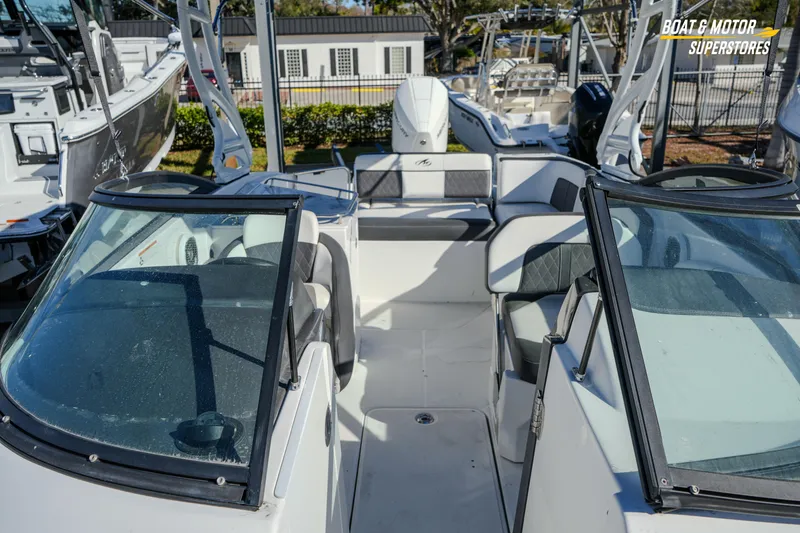 Slide: The Image of 2020 Monterey M-65 boat interior with seating, displayed at Boat & Motor Superstores. - 33