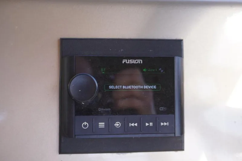 Slide: The Image of Fusion audio control panel on 2021 Massimo Marine P23 MAX LIMITED boat. - 12