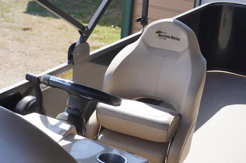 Slide: The Image of Steering area of 2021 Massimo Marine P23 MAX LIMITED boat with branded seat. - 7