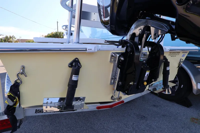 Slide: The Image of 2026 Mitzi Skiffs 17 Tournament boat with motor and trailer detail. - 13