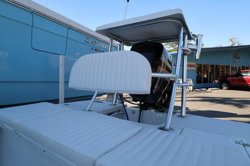 Slide: The Image of 2026 Mitzi Skiffs 17 Tournament boat with white seating and Mercury engine. - 14