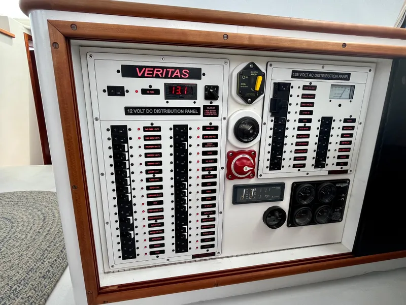 Slide: The Image of Electrical control panel on 2016 Wesmac 42 boat, featuring Veritas 12V DC distribution. - 31