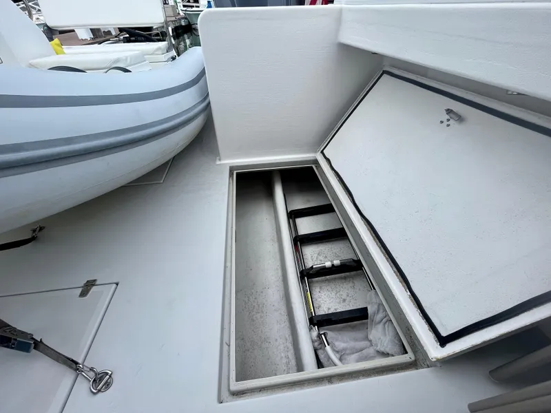 Slide: The Image of Wesmac 42 boat deck with open storage compartment, 2016 model. - 13