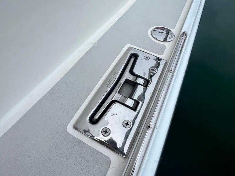 Slide: The Image of 2016 Wesmac 42 boat cleat and deck detail with chrome finish. - 22