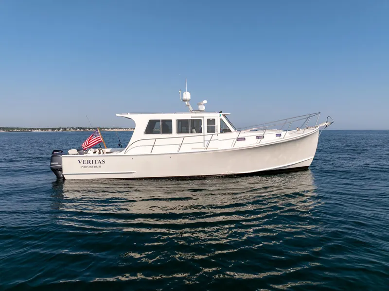 The Image of 2016 Wesmac 42 boat on calm water. - 0