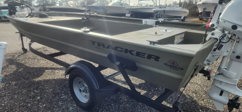 Slide: The Image of 2024 Tracker 1754 GRIZZLY boat on trailer, side view. - 3