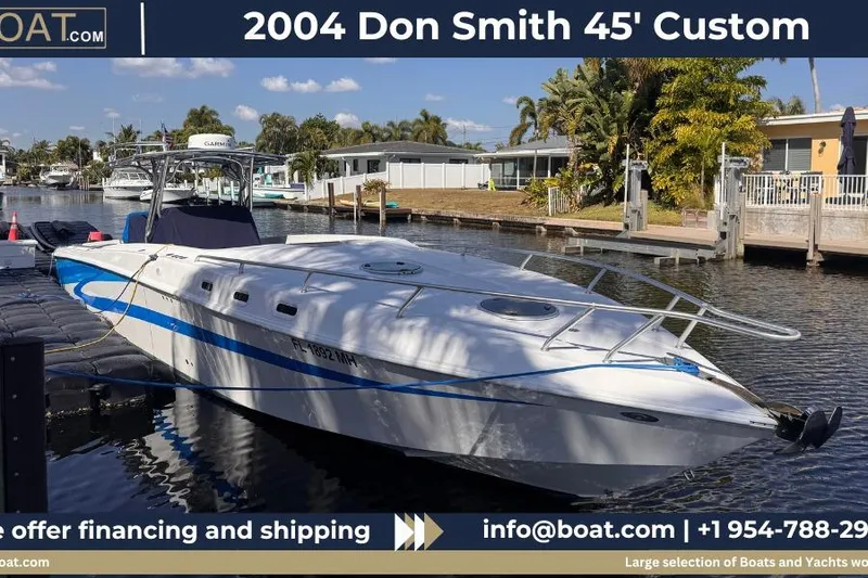The Image of 2004 Don Smith 45' Custom boat docked in a sunny canal setting. - 0