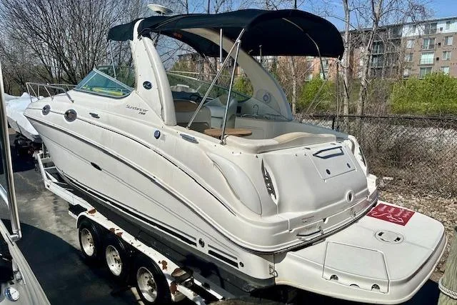 Slide: The Image of Steering wheel of a 2009 Sea Ray Sundancer 280 boat, covered for protection. - 10