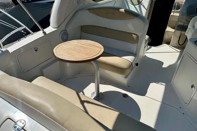 Slide: The Image of Interior of 2009 Sea Ray Sundancer 280 with dining area and cozy seating. - 13