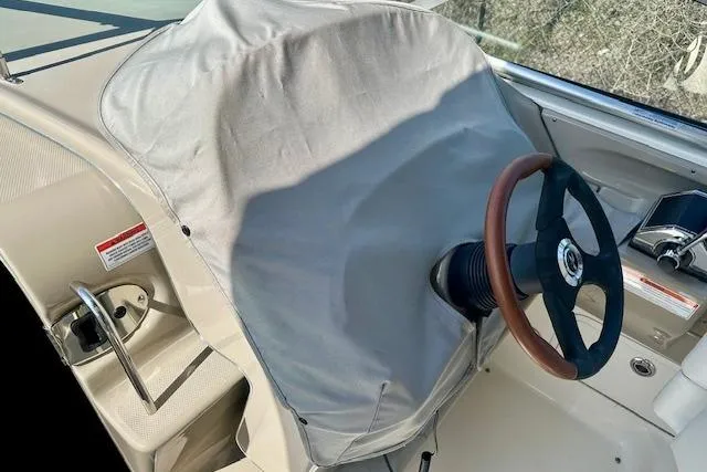 Slide: The Image of 2009 Sea Ray Sundancer 280 bathroom with sink, toilet, and mirror. - 16