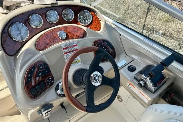 Slide: The Image of Interior of 2009 Sea Ray Sundancer 280 yacht with kitchen and dining area. - 17