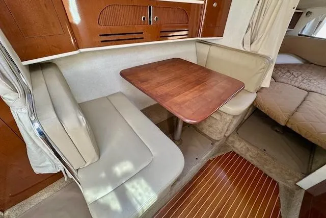 Slide: The Image of Dashboard of a 2009 Sea Ray Sundancer 280 boat with speed and RPM gauges. - 19