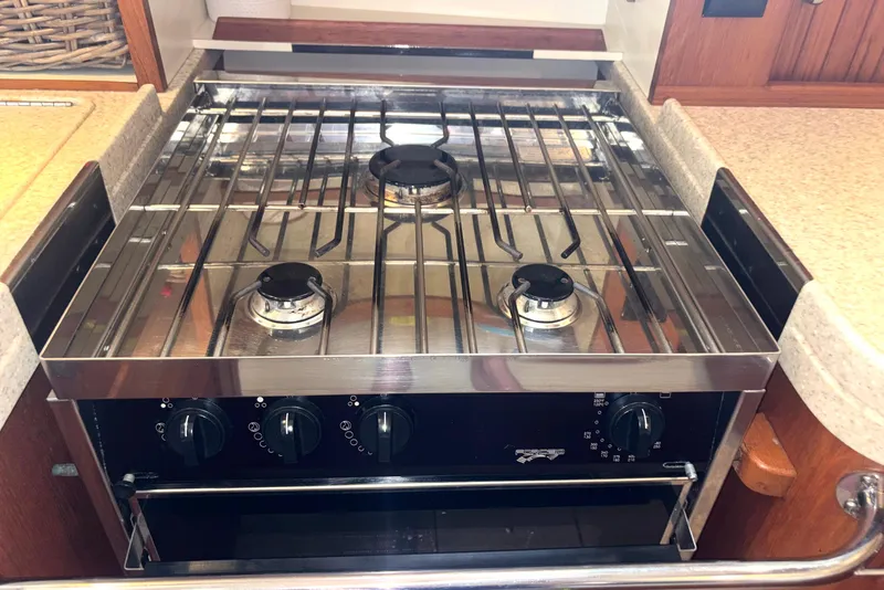 Slide: The Image of Stainless steel stove in 2006 Island Packet 440 yacht kitchen. - 11