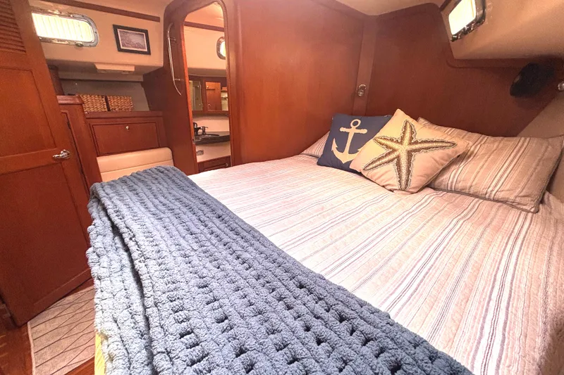 Slide: The Image of Cozy cabin interior of 2006 Island Packet 440 yacht with nautical-themed decor. - 19