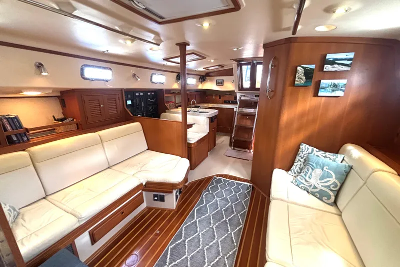 Slide: The Image of Luxurious interior of 2006 Island Packet 440 yacht with elegant seating and wooden finishes. - 20