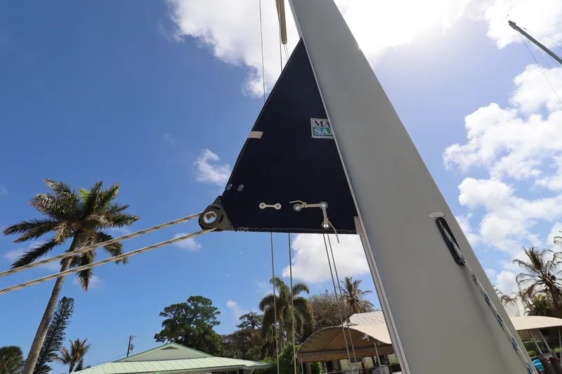 Slide: The Image of Sailboat mast and rigging of 2006 Island Packet 440 under a clear blue sky. - 33