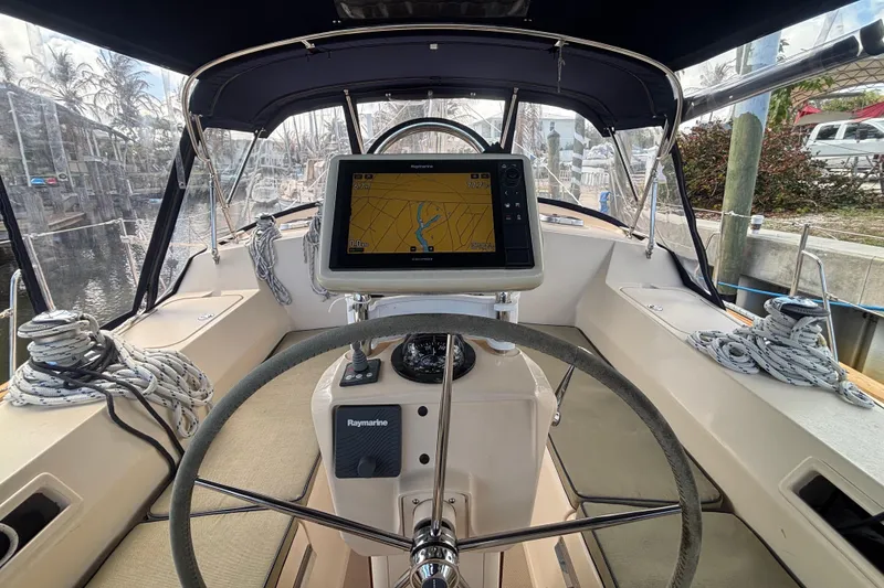 Slide: The Image of Cockpit view of 2006 Island Packet 440 sailboat with navigation system and steering wheel. - 5