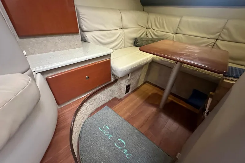Slide: The Image of 2005 Formula 37 PC yacht interior with cozy seating and wooden table. - 22